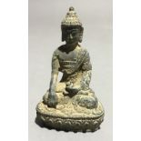 A miniature bronze Buddha