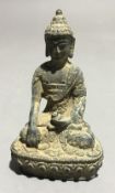 A miniature bronze Buddha