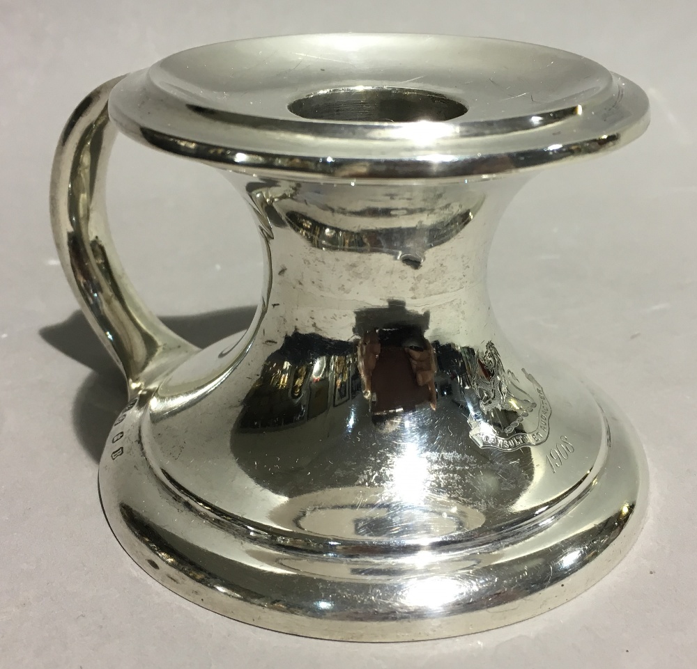 A Scottish silver Arts and Crafts chamberstick, makers Hamilton and Inches,