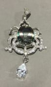 A silver and multi-stone pendant