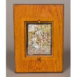 A miniature painted wooden puzzle Depicting Adam and Eve before the Tree of Life with entwined