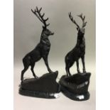 A pair of bronze stags