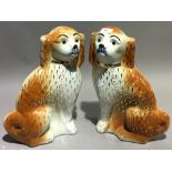 A pair of large Staffordshire spaniels
