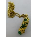 A silver gilt pendant and chain,