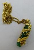 A silver gilt pendant and chain,