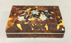 A Victorian mother-of-pearl inlaid tortoiseshell vanity box