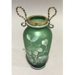 A green decorative glass vase