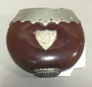 A silver plate mounted nut form vesta