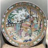 A large Chinese porcelain charger Well painted with a scholarly figure,