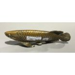 A brass model of a fish