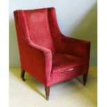 A Victorian red upholstered armchair