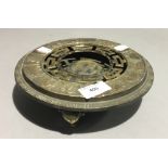 A Chinese brass ashtray