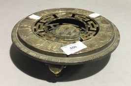 A Chinese brass ashtray