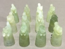 A set of twelve jade thimbles