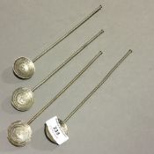 Four silver South American mote straws