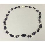 An amethyst and quartz bead necklace