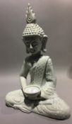 A large porcelain model of Buddha
