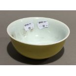 A Chinese yellow porcelain bowl