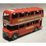 A tin toy London bus