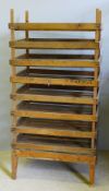 A vintage wooden fruit storage rack