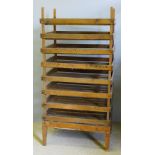 A vintage wooden fruit storage rack