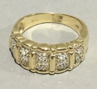 A 9 ct gold and diamond ring