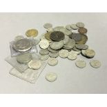 A tin containing a quantity of coins,