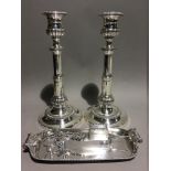 A pair of 19th century Sheffield plated candlesticks,