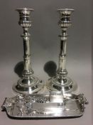 A pair of 19th century Sheffield plated candlesticks,