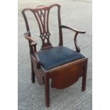 A George III mahogany commode chair