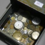 A metal drawer containing pocket watches, spares,