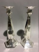 An unusual pair of sterling silver Art Deco candlesticks, American,