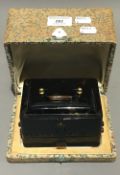 A cased jewellery box