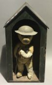 A vintage sentry box teddy bear