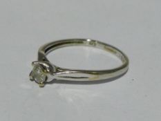 A 9 ct white gold diamond set solitaire ring