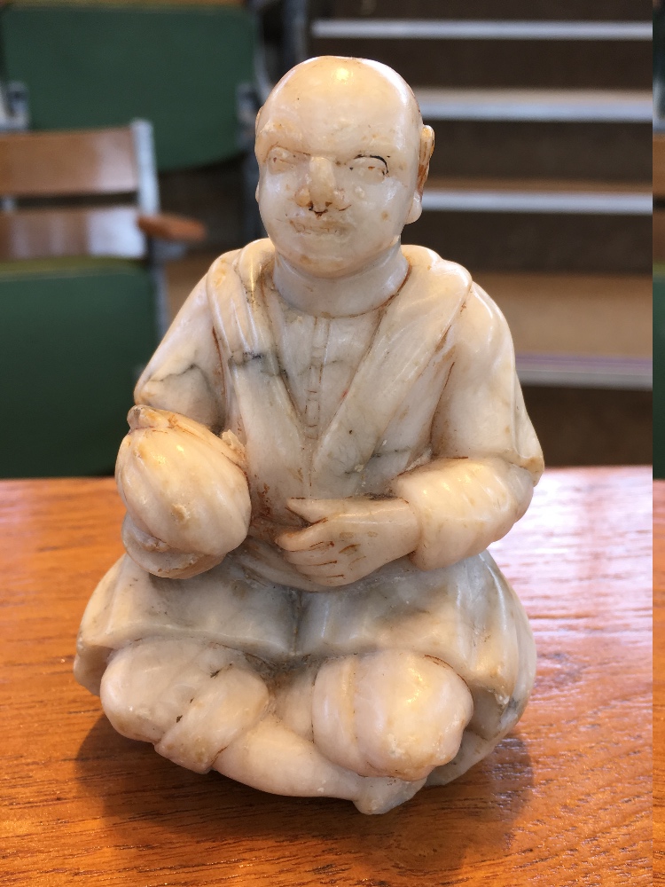 A 19th century Oriental soapstone figure Modelled as a seated gentleman, holding a gourd. - Image 2 of 7