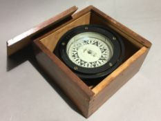 An early 20th century boxed ships compass by E.S.