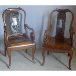 A pair of late 19th/early 20th century Chinese carved hardwood open armchairs Each with curved