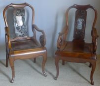 A pair of late 19th/early 20th century Chinese carved hardwood open armchairs Each with curved