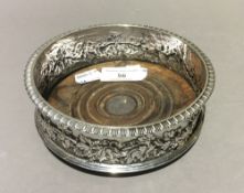 A silver wine coaster, London 1900,