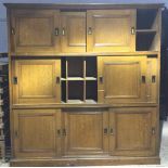 A Victorian grained pine housekeepers cupboard