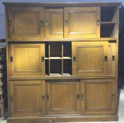 A Victorian grained pine housekeepers cupboard