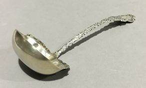 A silver ladle