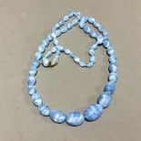 A Venetian blue glass bead necklace