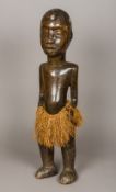 A large African tribal carved wooden male marriage or fertility ancestor figure,