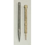 A Victorian unmarked yellow metal propelling pencil and a sterling silver propelling pencil