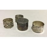 A silver napkin ring,