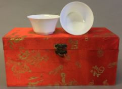 A pair of Chinese porcelain tea bowls Anhua decorated with phoenixes,