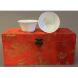 A pair of Chinese porcelain tea bowls Anhua decorated with phoenixes,