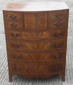 A Georgian style mahogany bow front chest of drawers